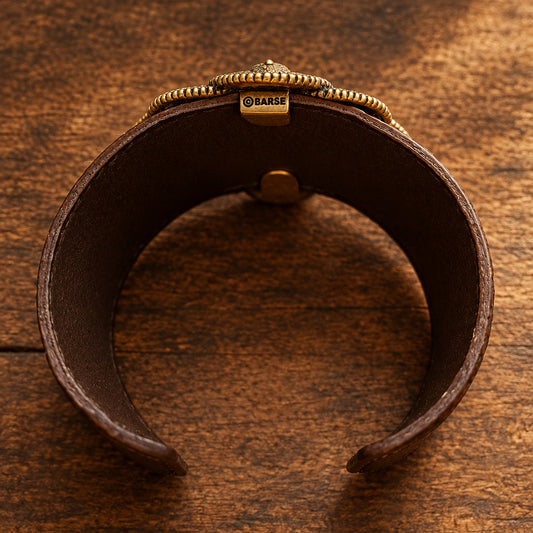 Interior view of brown leather cuff and Barse signature