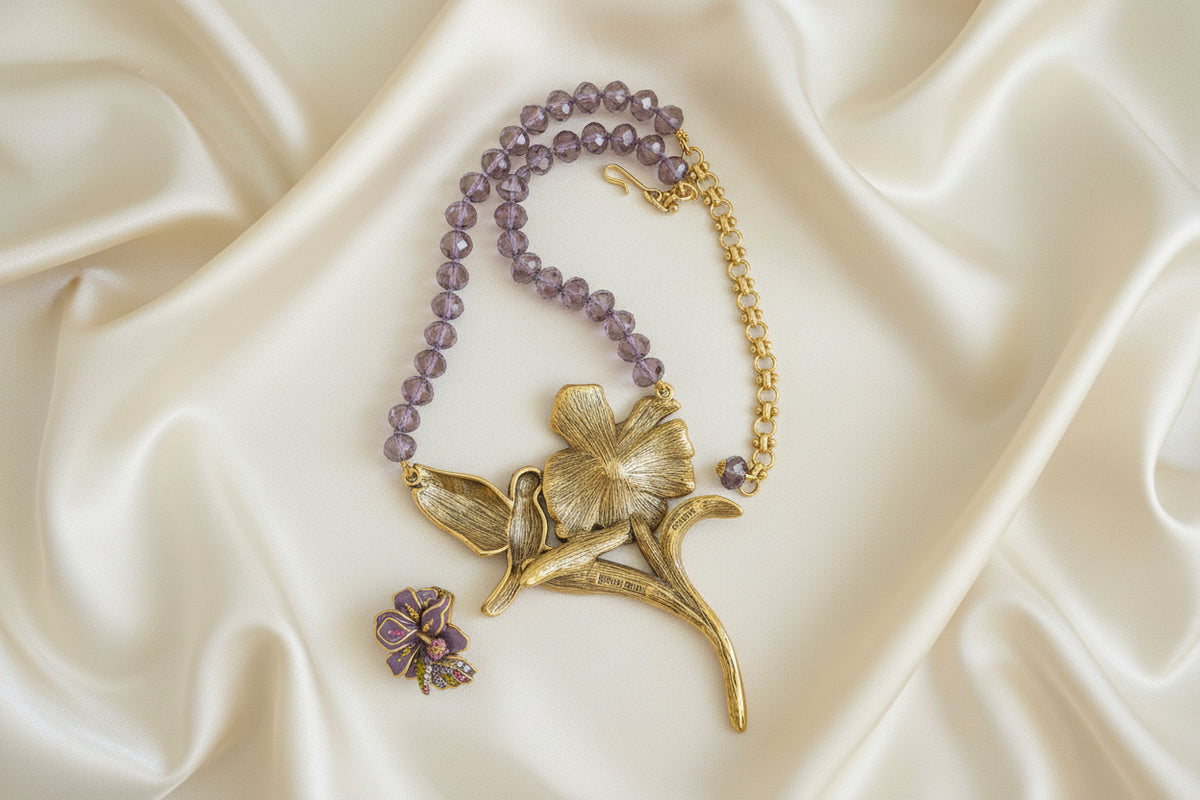 Heidi Daus Nectar of Life purple flower and hummingbird necklace with matching ring