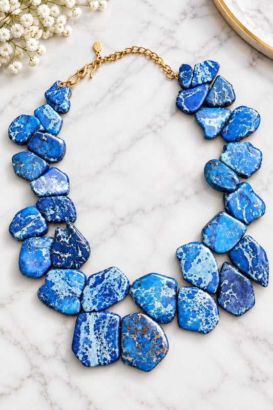 Barse necklace with irregular blue impression jasper slabs and antiqued bronze hardware