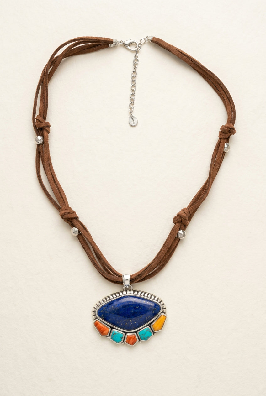 Full tan multi-cord necklace showing pendant, lobster clasp, and extension chain