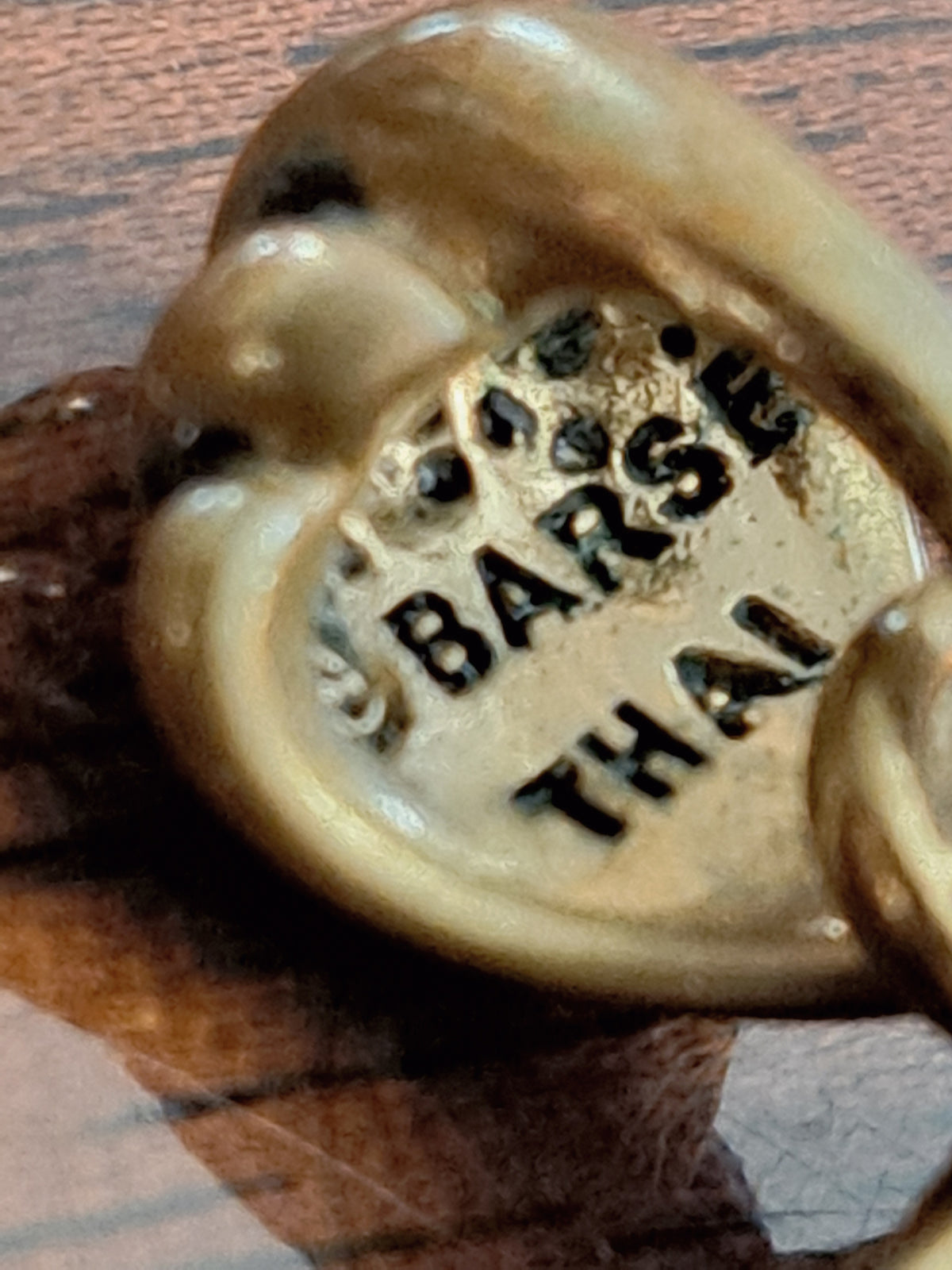 Bail close-up showing BARSE THAI marking