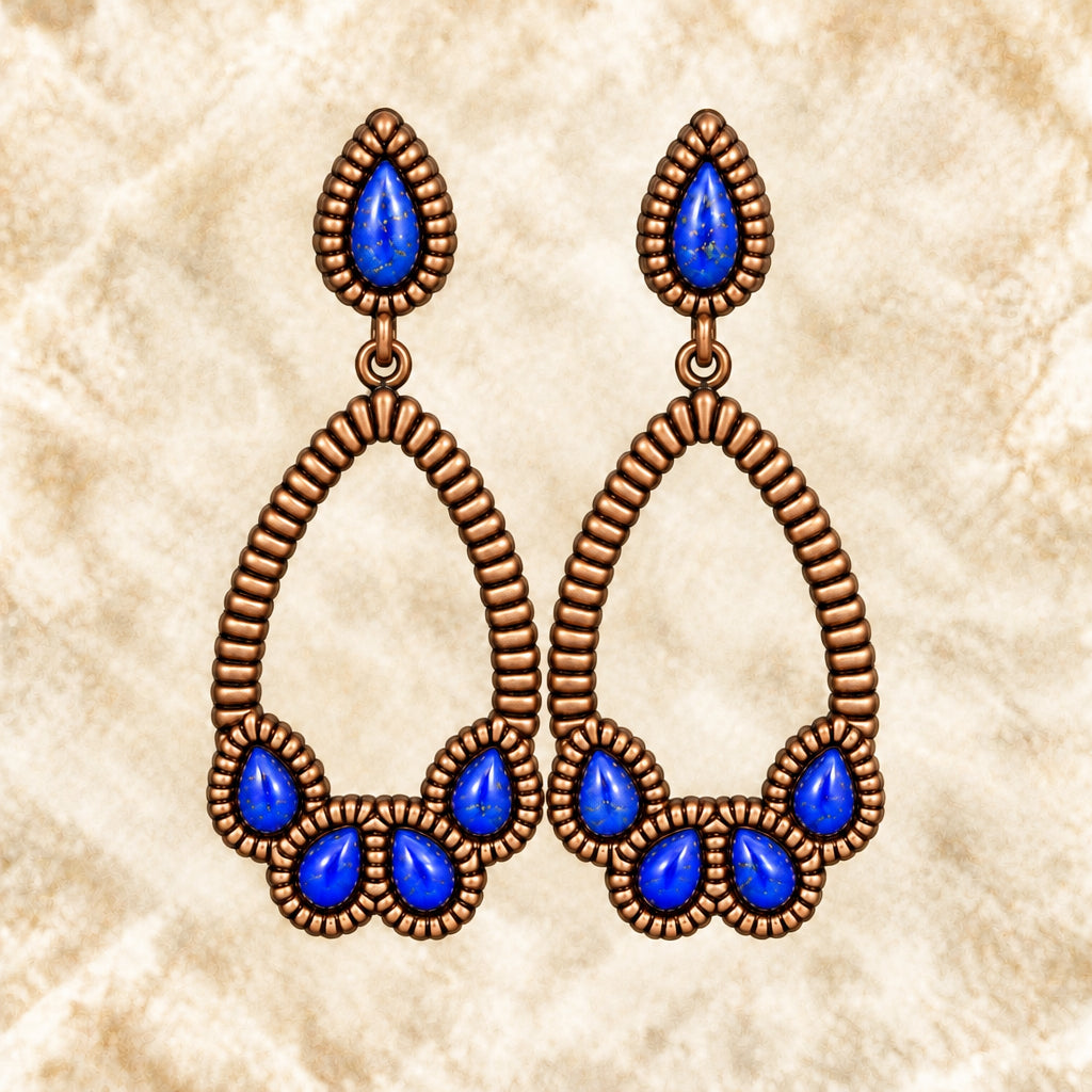 Front view of Barse blue-accented teardrop dangle earrings
